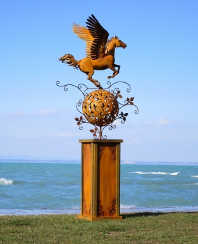 Pegasus statuette on pillar rusty